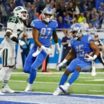 urn-publicid-ap-org-87accc5b27f34c98994c6712a01b91bfJets_Lions_Football_77363