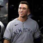 Aaron-Judge-New-York-Yankees-smiling-dugout-Texas-October-4-2022